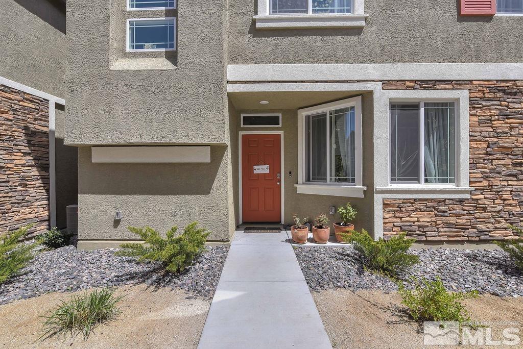 9622 Windjammer Way Reno, NV 89506 - Photo 1 of 29 a front view of a house