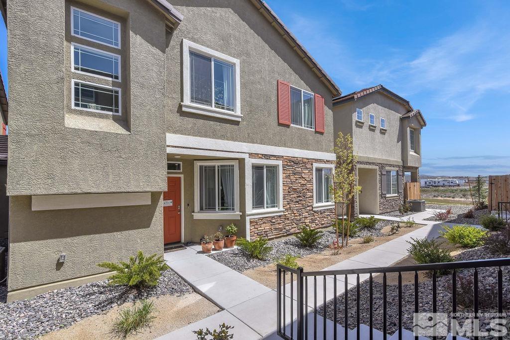 9622 Windjammer Way Reno, NV 89506 - Photo 2 of 29 a front view of a house with a porch