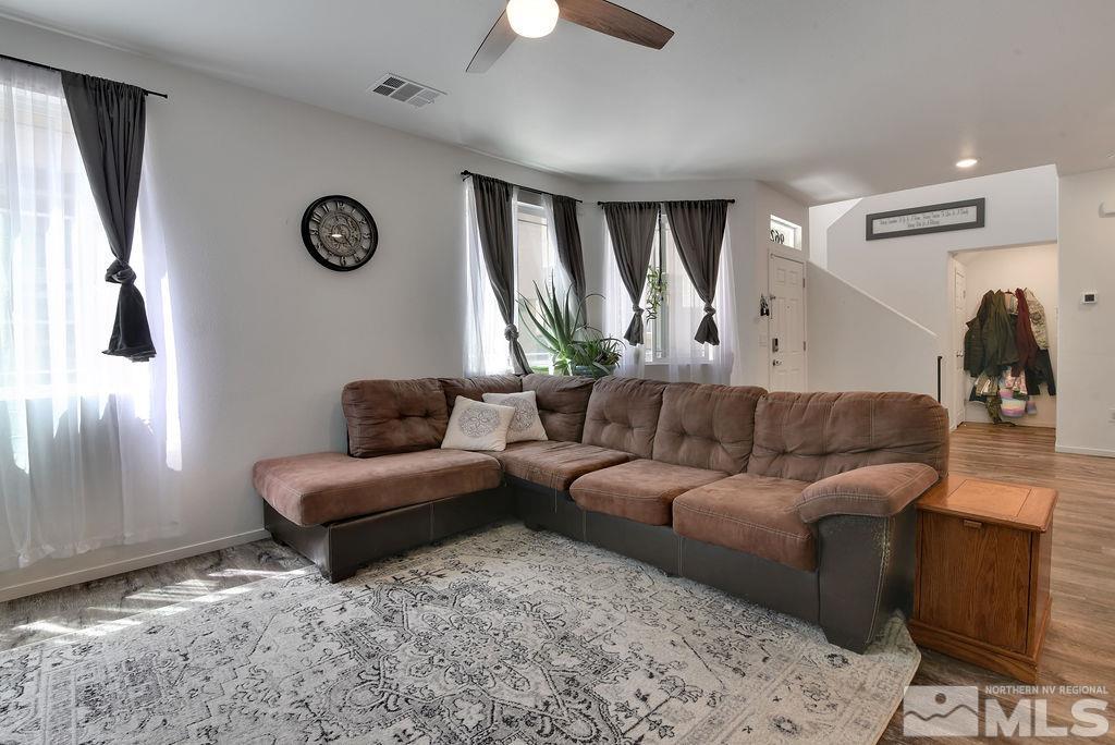 9622 Windjammer Way Reno, NV 89506 - Photo 4 of 29 a living room with furniture and a window