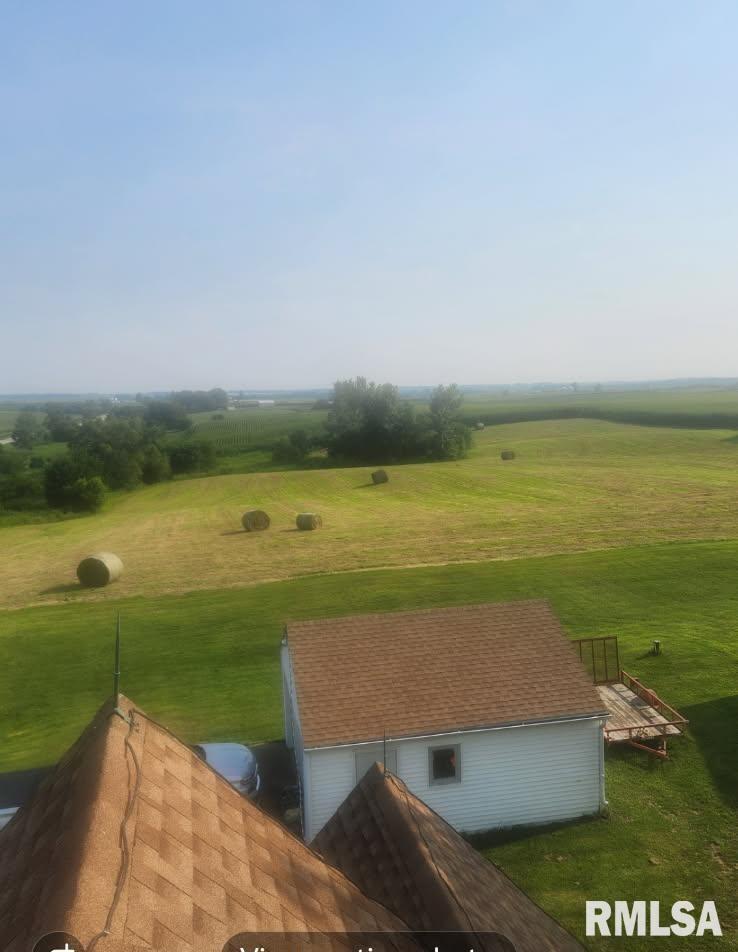 96 Highway 67 Alexis, IL 61412 - Photo 15 of 24 a view of a lake with a big yard