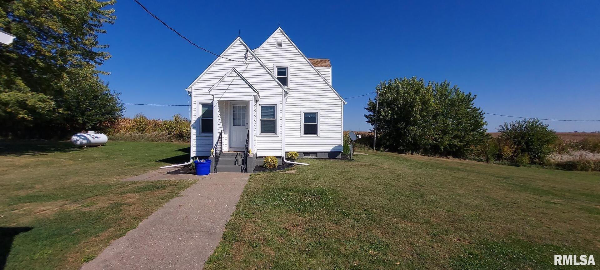 96 Highway 67 Alexis, IL 61412 - Photo 3 of 24 a view of a house with backyard and garden