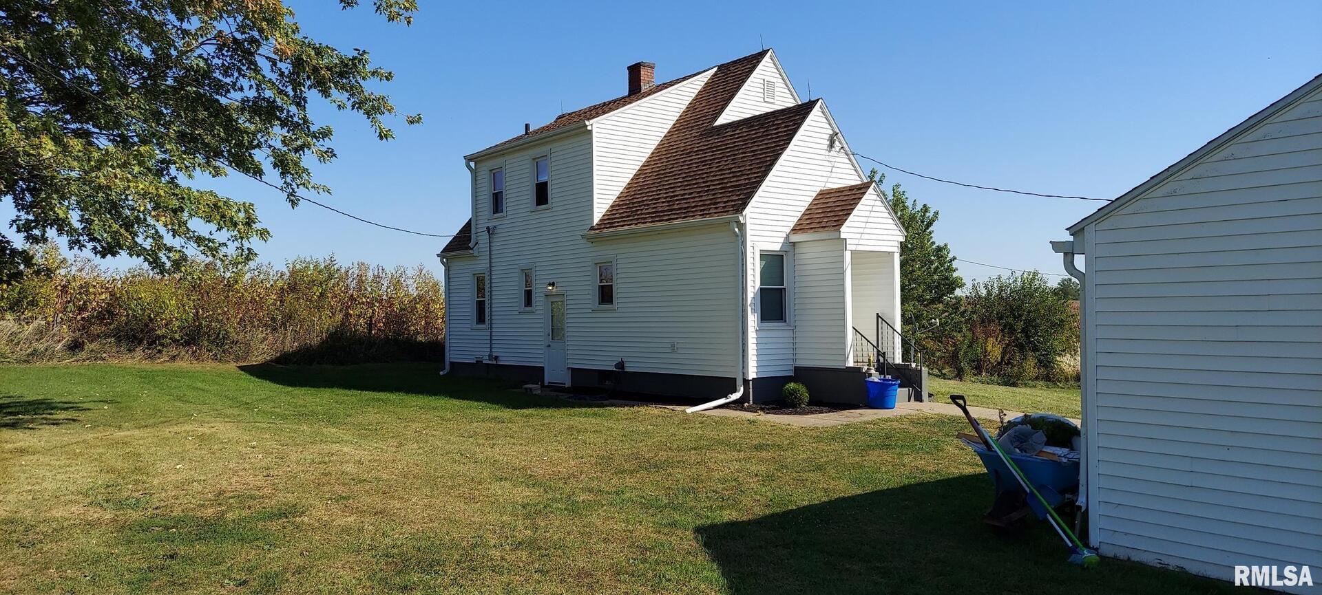 96 Highway 67 Alexis, IL 61412 - Photo 4 of 24 a view of balcony and garden
