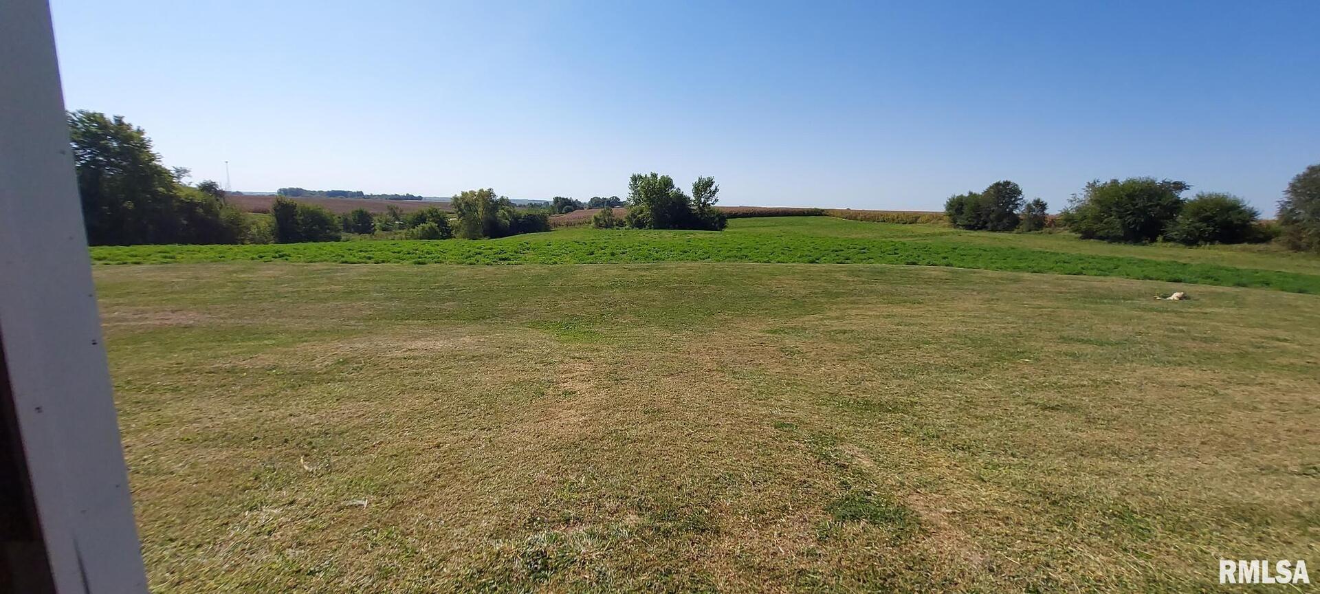 96 Highway 67 Alexis, IL 61412 - Photo 9 of 24 a view of a field with an trees