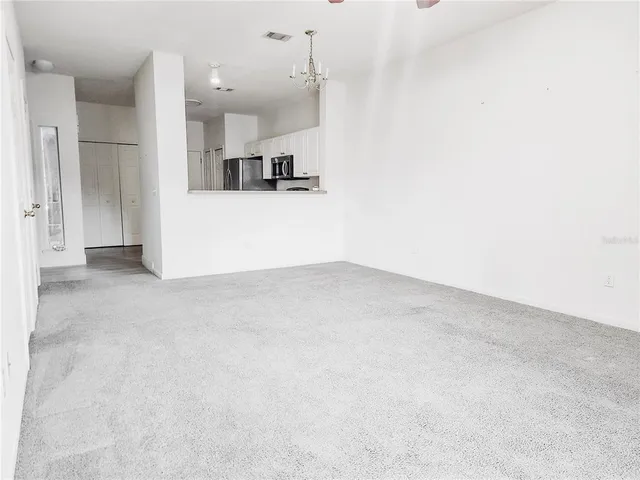 a view of a kitchen with a sink