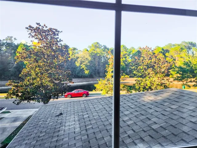 a street view with tall buildings