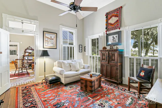 a living room with furniture and a window