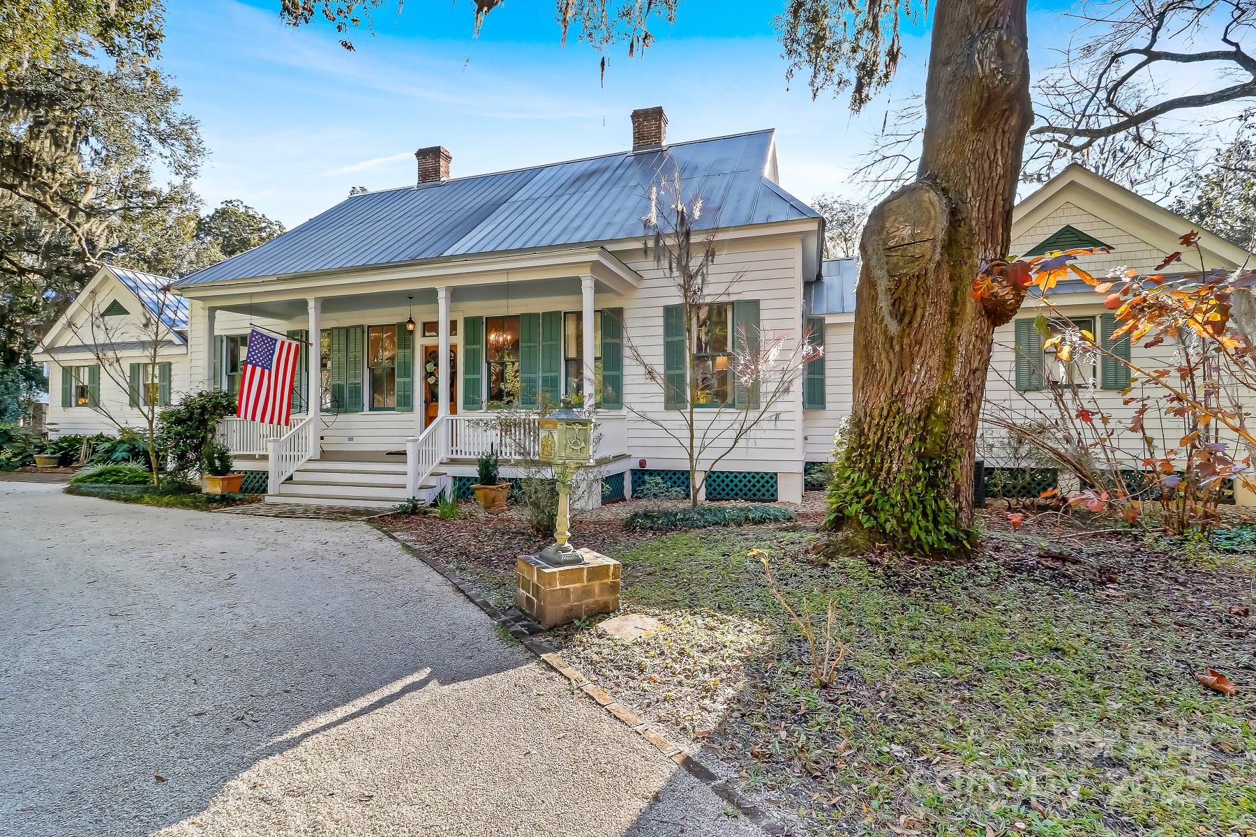 131 Pritchard Street Bluffton, SC 29910 - Photo 4 of 47 a view of a house with backyard porch and sitting area