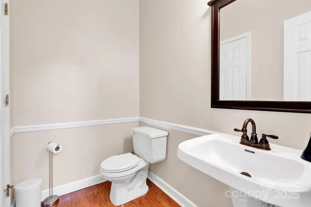 a view of a livingroom and a hallway