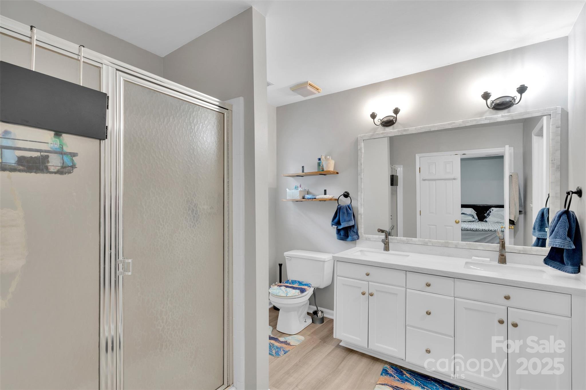 2518 Pimpernel Road Charlotte, NC 28213 - Photo 20 of 22 a spacious bathroom with a double vanity sink and a mirror