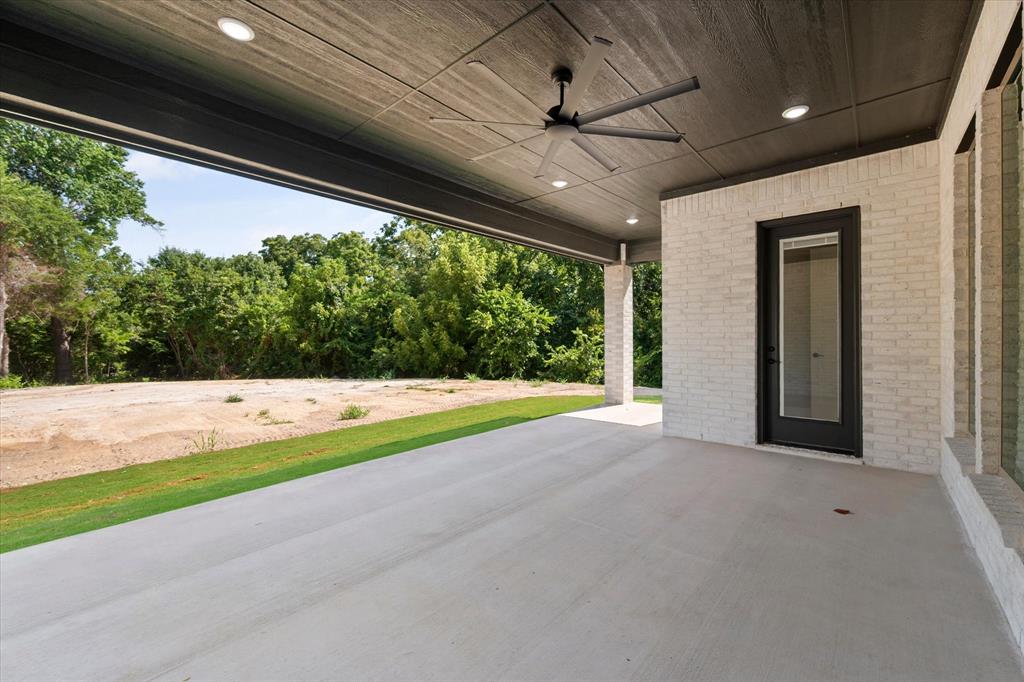 7631 Woodstream Road Midlothian, TX 76065 - Photo 39 of 40 Spacious covered patio with concrete flooring, recessed lighting, and a ceiling fan