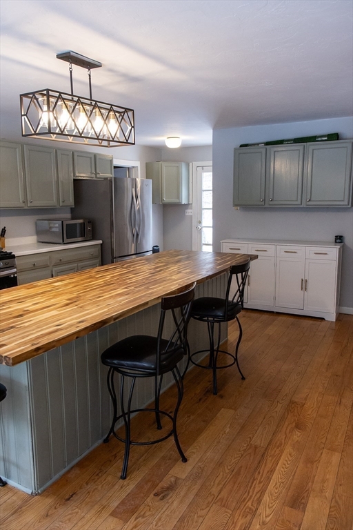 20 Paige Hill Road Brimfield, MA 01010 - Photo 14 of 40 a kitchen with a table and chairs in it