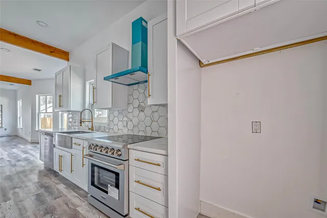 a kitchen with a stove and a microwave