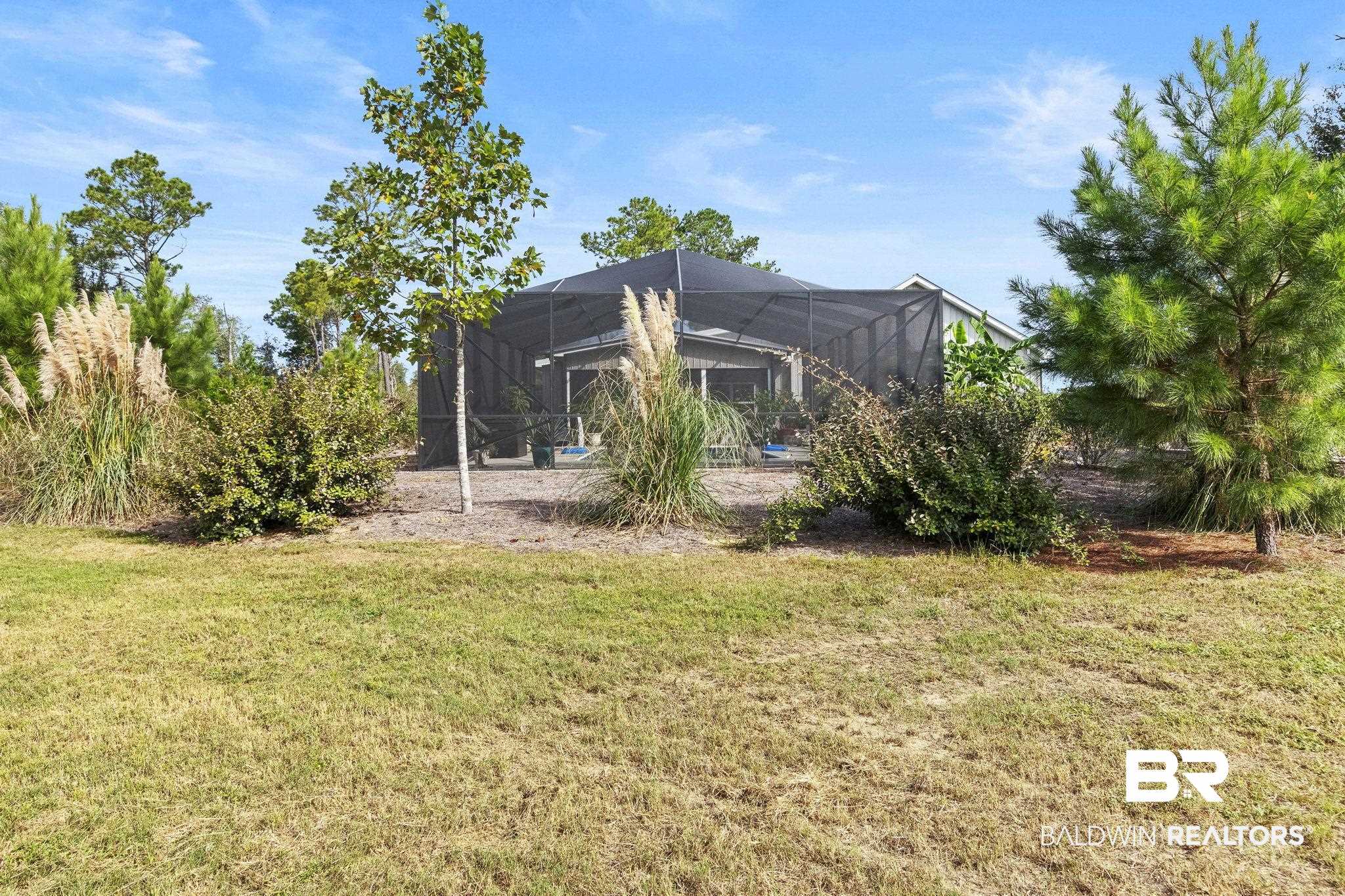 26071 Woerner Road Elberta, AL 36530 - Photo 62 of 86 View of yard featuring a lanai