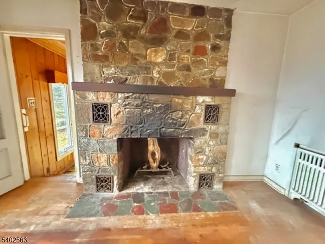 a view of an entryway with a fireplace