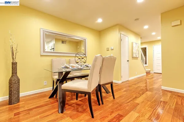 a spacious bathroom with a double vanity sink and a mirror