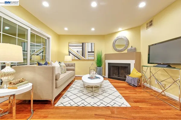 a living room with furniture and a table