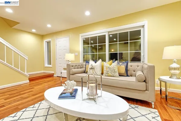 a kitchen with stainless steel appliances a sink and a cabinets