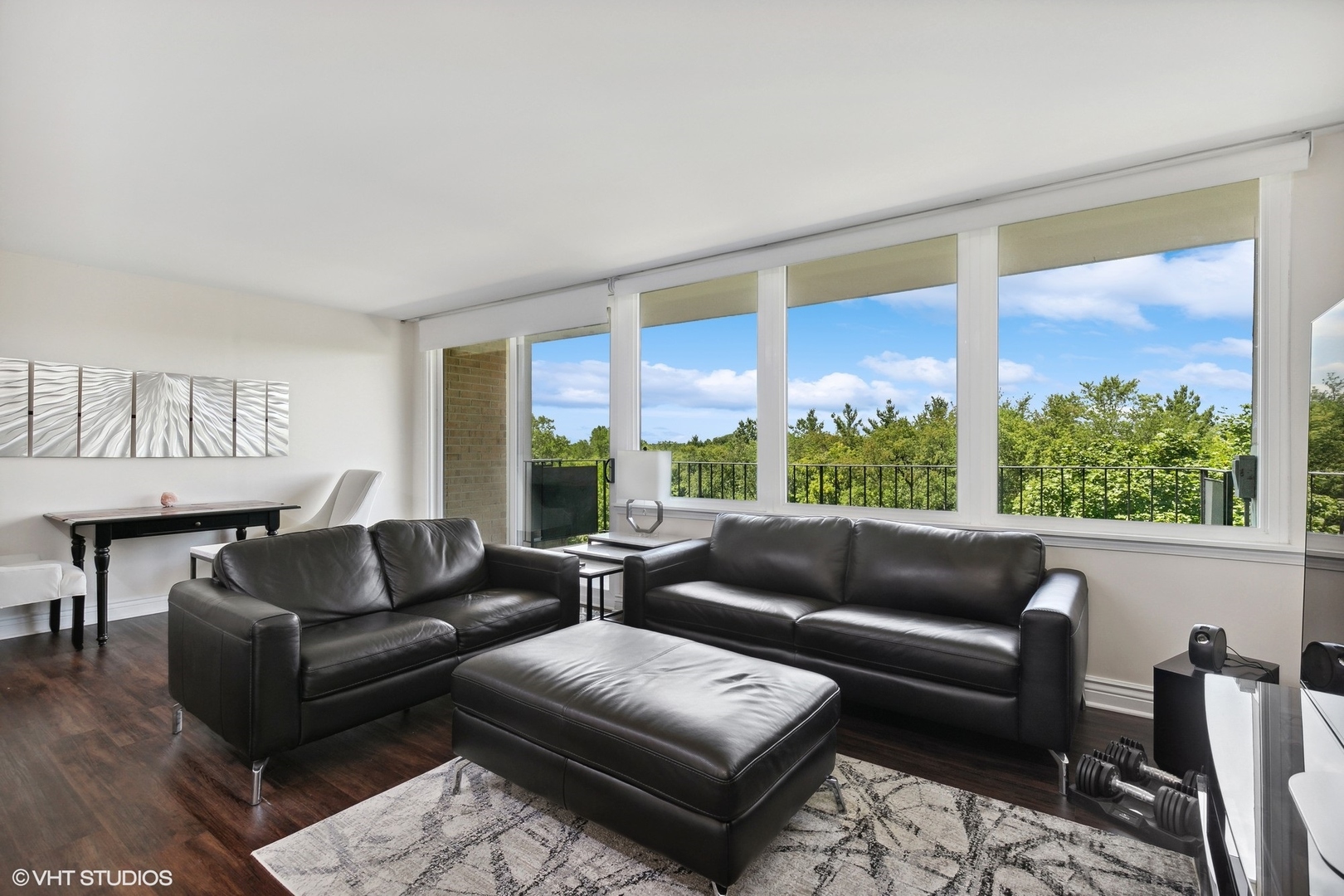 101 Bar Harbour Road, Unit 6E Schaumburg, IL 60193 - Photo 12 of 23 a living room with furniture and a large window