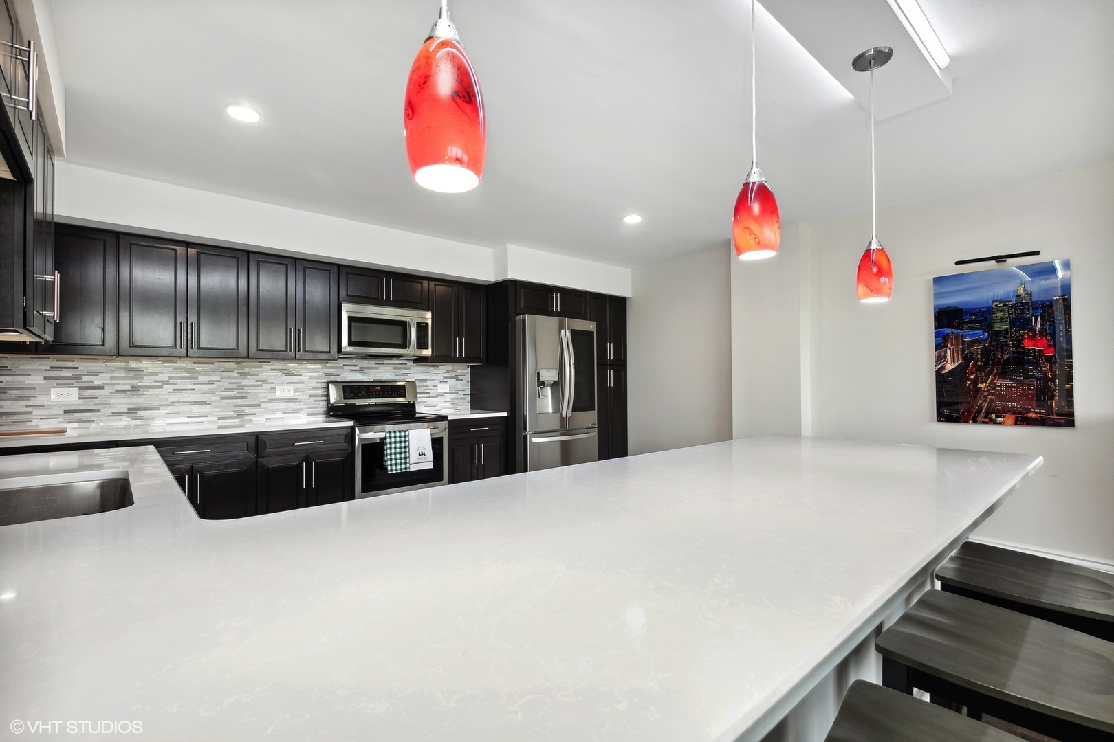 101 Bar Harbour Road, Unit 6E Schaumburg, IL 60193 - Photo 6 of 23 a kitchen with granite countertop stainless steel appliances and cabinets