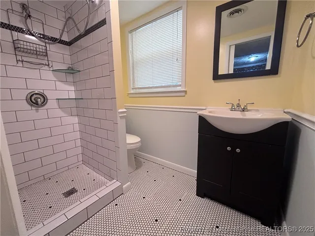 a view of a backyard with sitting area