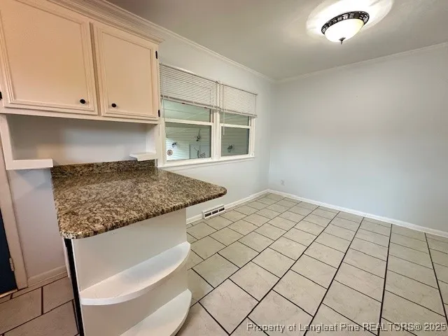 a bathroom with a toilet a sink and a shower