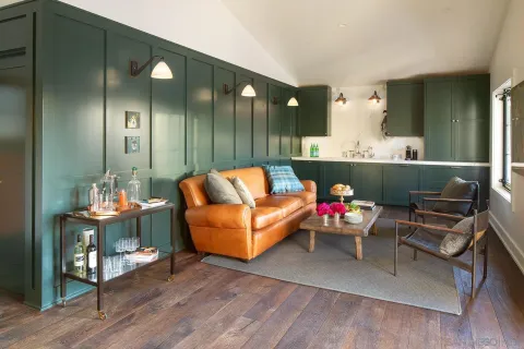 a bathroom with a sink toilet and a mirror