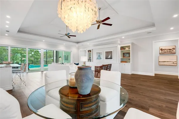 a living room with furniture or couch and a wooden floor