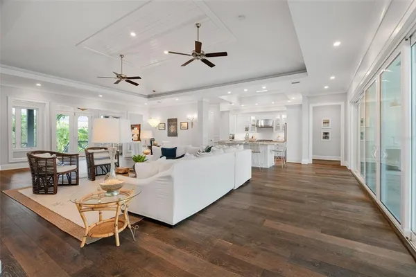 a spacious bathroom with a double vanity sink a mirror and a shower