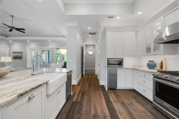 a bathroom with a toilet a sink and a mirror