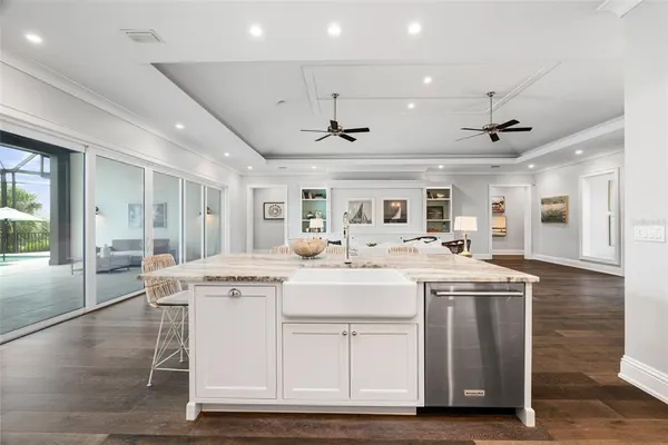 a living room with a bed and a window