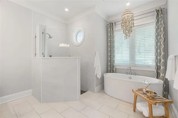a view of a livingroom with a ceiling fan and window