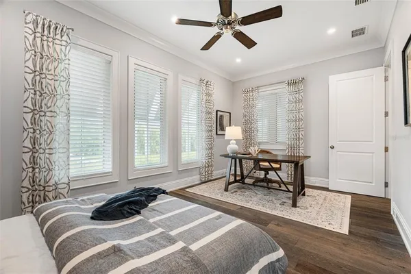 a view of a backyard with a swimming pool