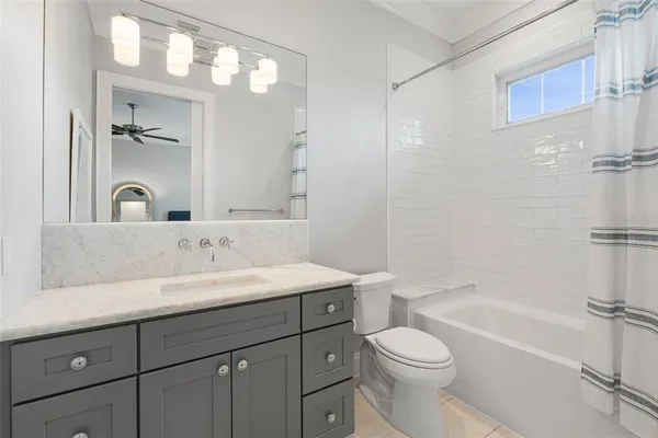 a kitchen with stainless steel appliances a stove and a microwave