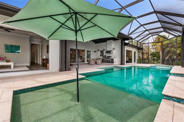 a view of a lake with a large trees