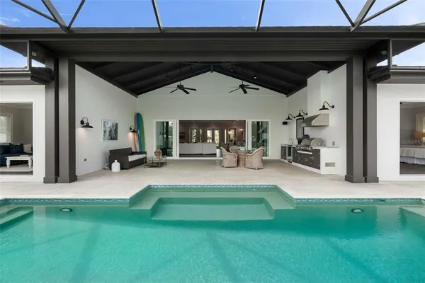 an aerial view of residential building with lake view