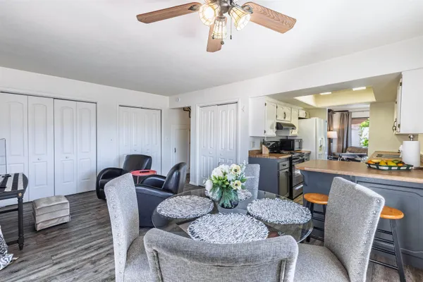a view of a dining room with furniture