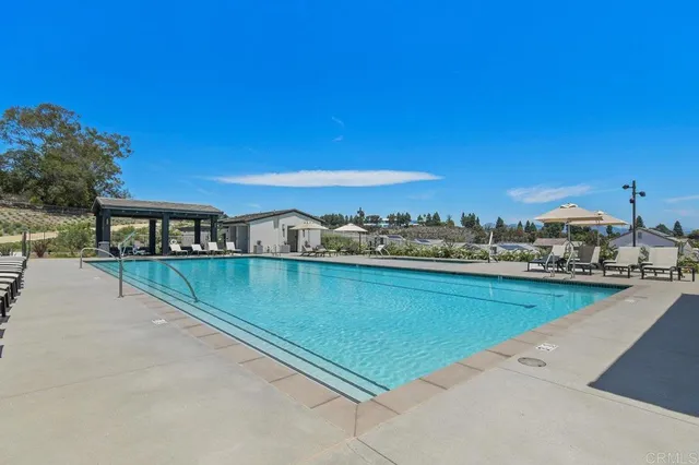 a view of a terrace with a garden and stairs