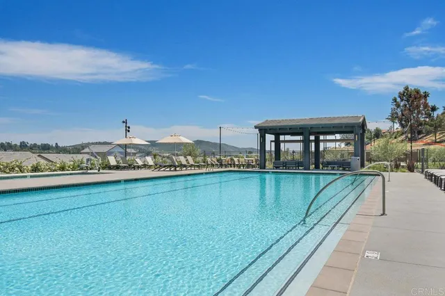 a view of a terrace with furniture and garden