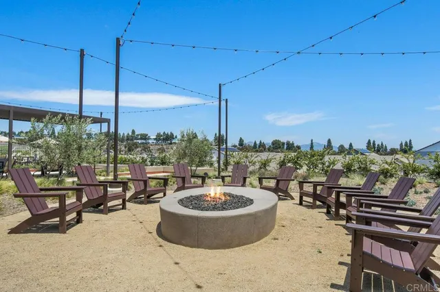 a view of a big dining room with furniture window and outside view