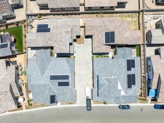 an aerial view of a house with a garden