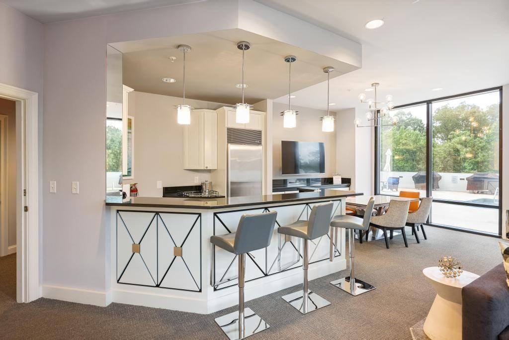 2828 Peachtree Road, Unit 2701 Atlanta, GA 30305 - Photo 12 of 39 a very nice looking dining room with a large glass table and chairs