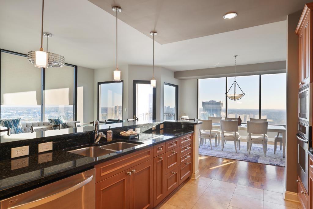 2828 Peachtree Road, Unit 2701 Atlanta, GA 30305 - Photo 14 of 39 a large kitchen with lots of counter space