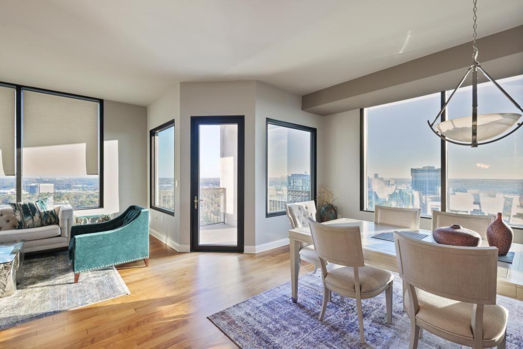 2828 Peachtree Road, Unit 2701 Atlanta, GA 30305 - Photo 17 of 39 a living room with furniture and a large window