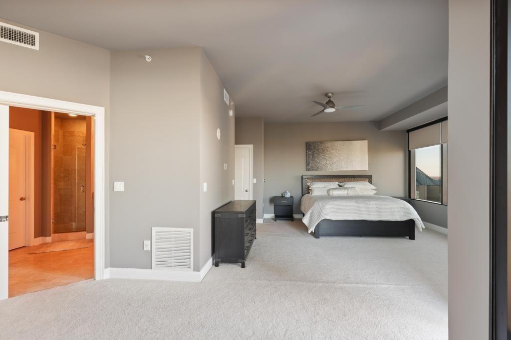 2828 Peachtree Road, Unit 2701 Atlanta, GA 30305 - Photo 21 of 39 a bedroom with furniture and window