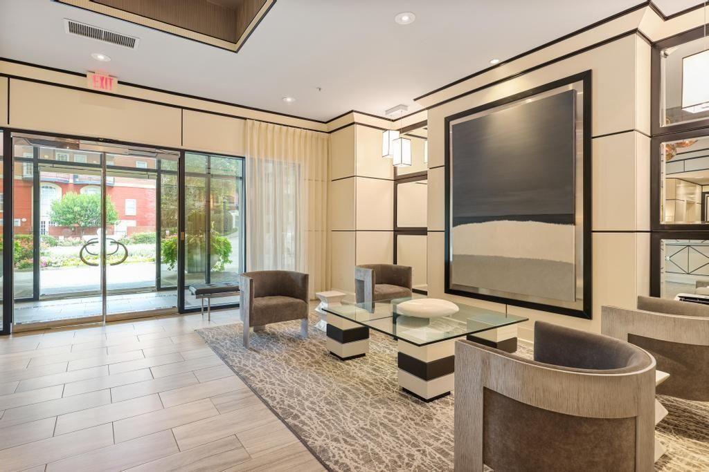 2828 Peachtree Road, Unit 2701 Atlanta, GA 30305 - Photo 34 of 39 a living room with furniture and a large window