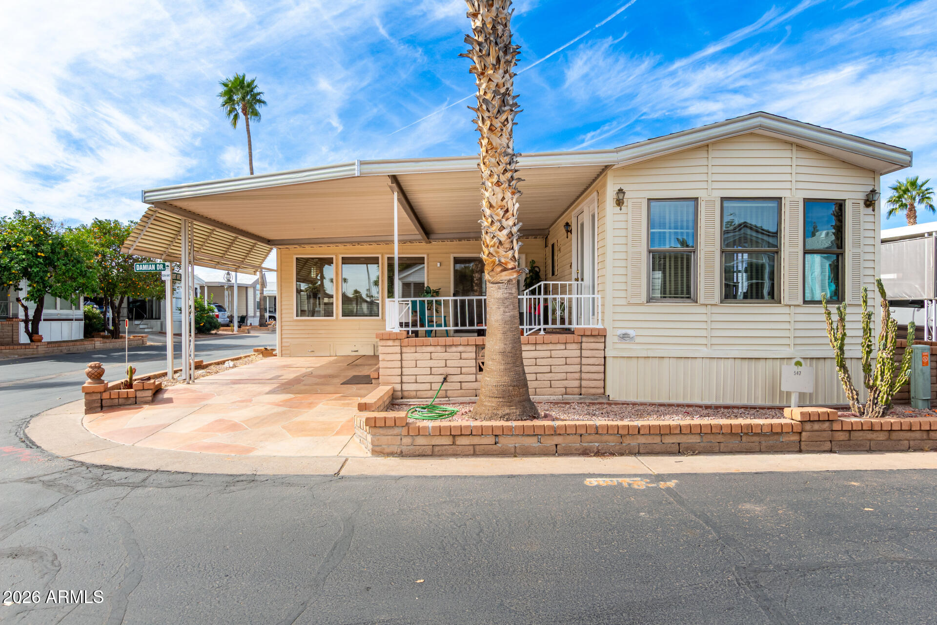 111 South Greenfield Road, Unit 547 Mesa, AZ 85206 - Photo 2 of 38 a view of a house with a outdoor space