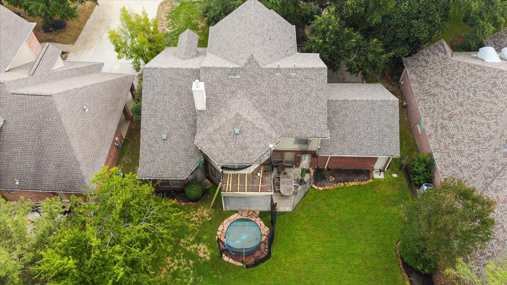 5718 Oakmoss Trail Spring, TX 77379 - Photo 49 of 50 Expansive backyard and upper balcony ideal for outdoor entertaining. (cowboy pool has been removed)