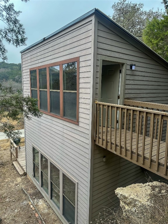 2709 Long Bow Trail Austin, TX 78734 - Photo 14 of 15 a view of a house with a balcony