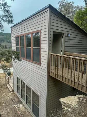 a view of a backyard with sitting area