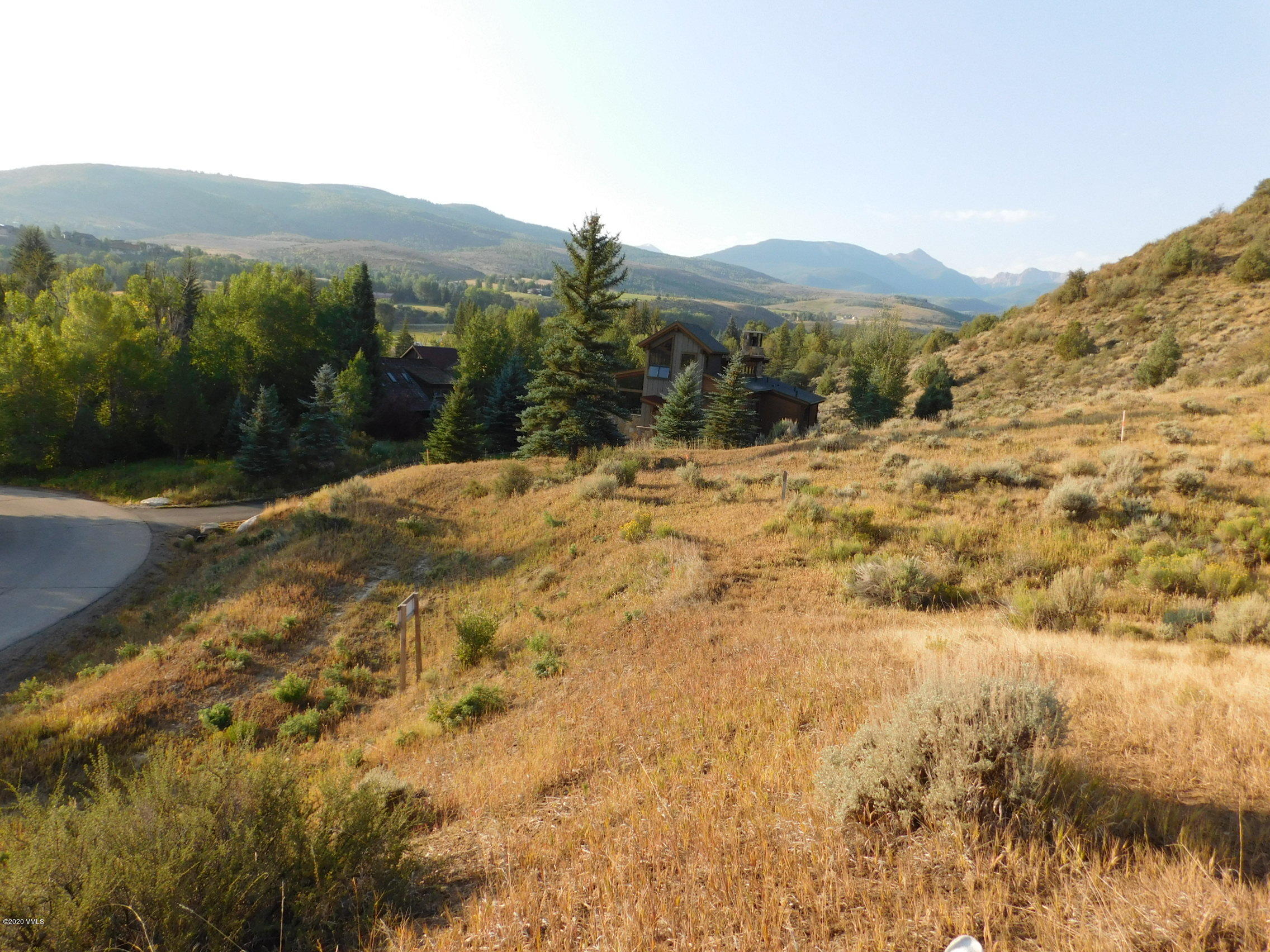 326 Brett Trail Edwards, CO 81632 - Photo 16 of 20 a view of a yard with a mountain